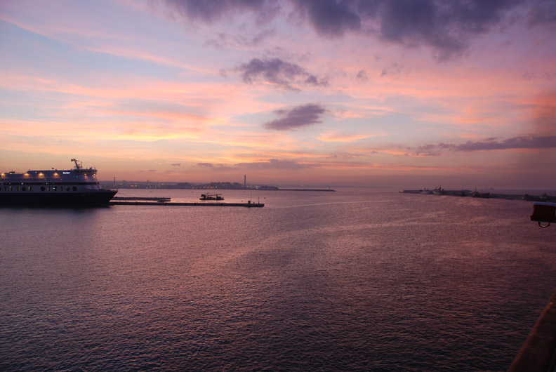 sunset from the harbor and the boat