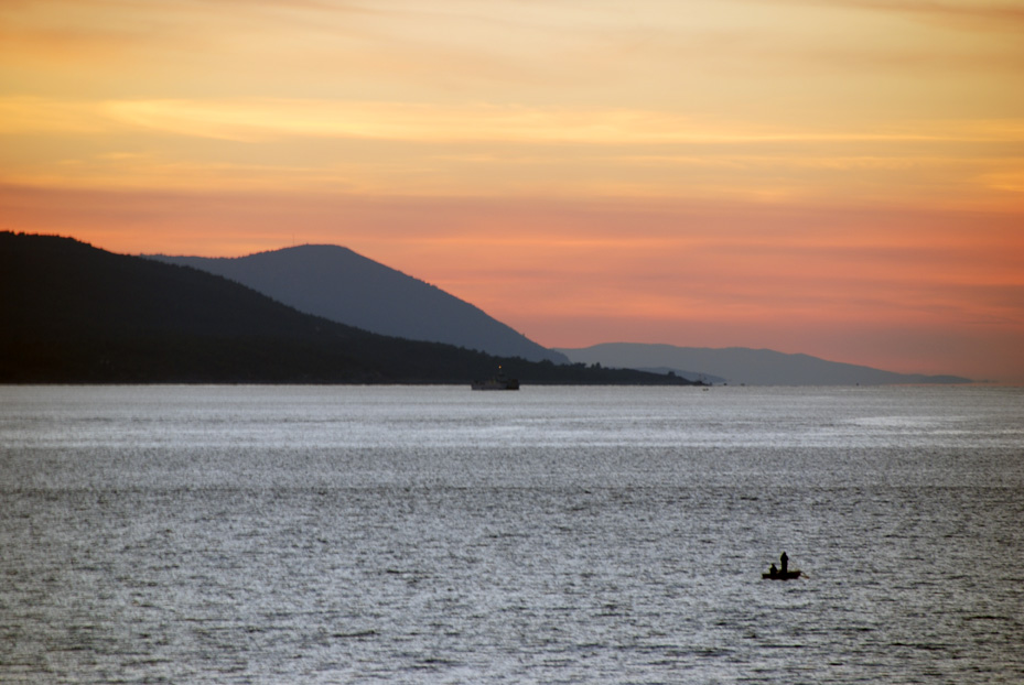 sunset with a fisherman