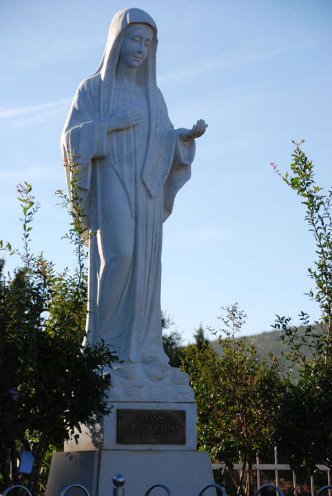 statue of mary at the top