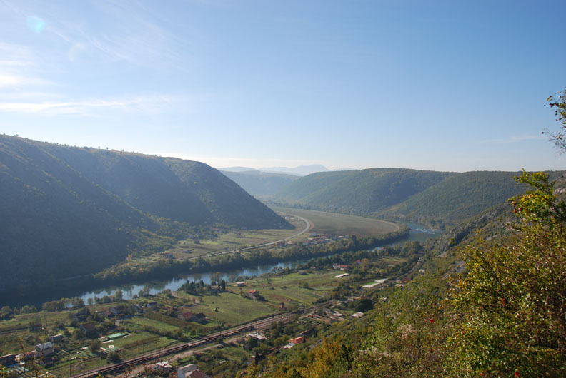 the river in the valley along the road